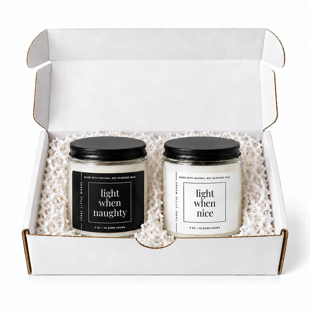 light when naughty / light when nice candle duo