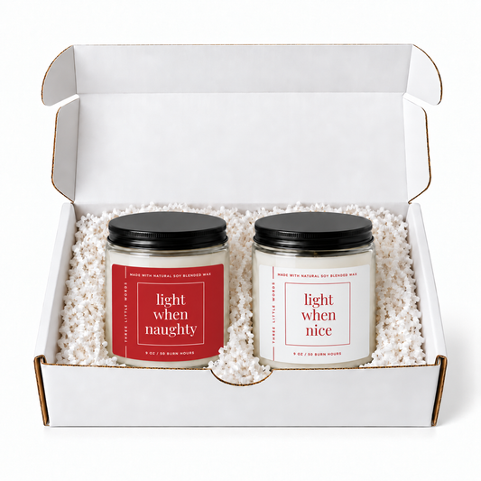 light when naughty / light when nice holiday candle duo